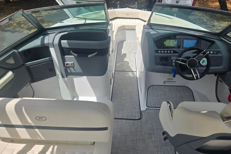 Slide: The Image of 2020 Cobalt R7 Surf boat interior with modern dashboard and seating. - 8