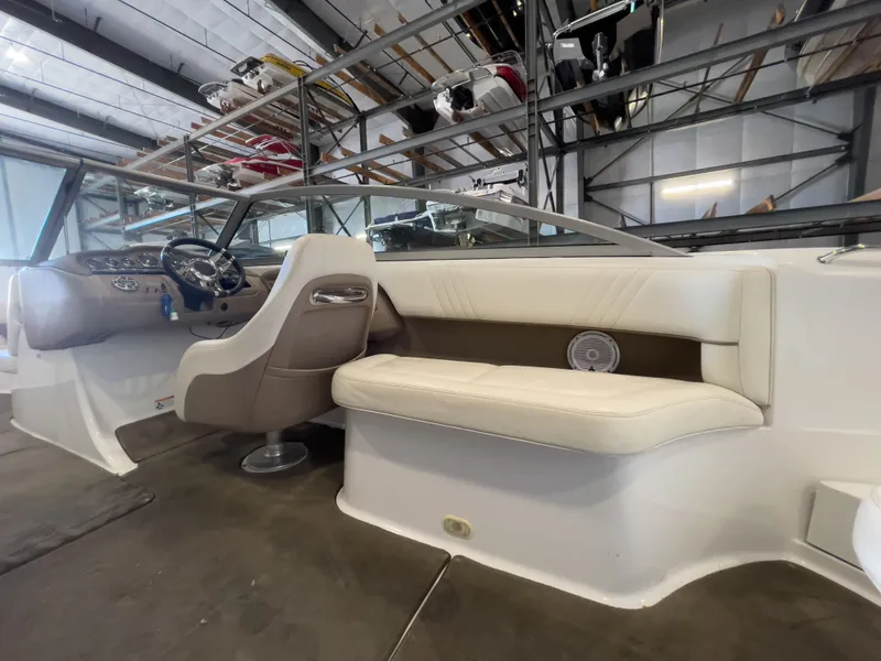 Slide: The Image of Interior of a 2008 Cobalt 252 boat in storage facility. - 10