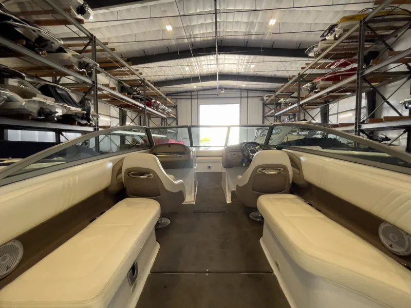 Slide: The Image of Interior of a 2008 Cobalt 252 boat in storage facility. - 11