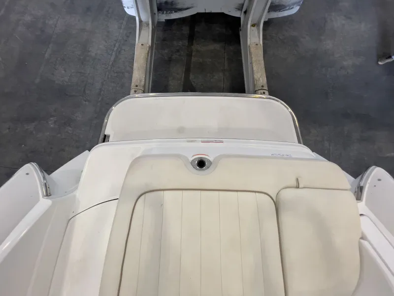 Slide: The Image of Rear view of a 2008 Cobalt 252 boat on concrete floor. - 12