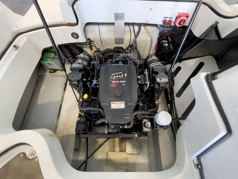 Slide: The Image of Engine compartment of a 2008 Cobalt 252 boat with MerCruiser 350 MAG MPI engine. - 13