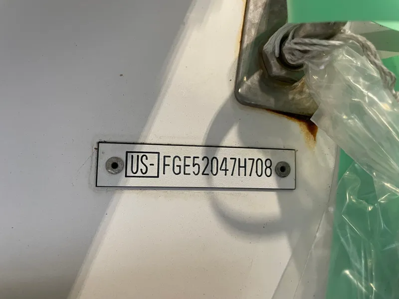 Slide: The Image of Serial number plate of a 2008 Cobalt 252 boat. - 14