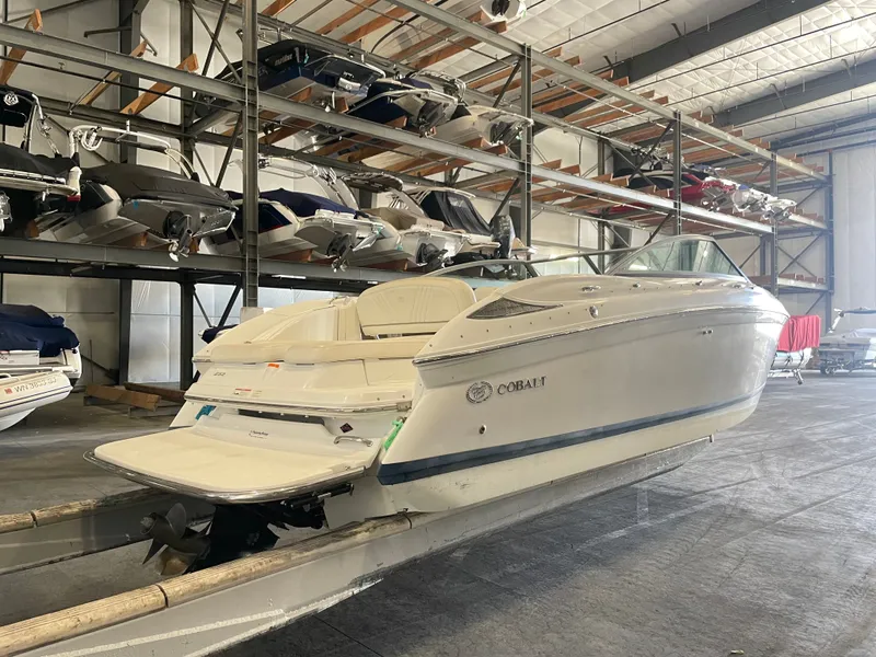 Slide: The Image of 2008 Cobalt 252 boat in storage facility on trailer. - 3