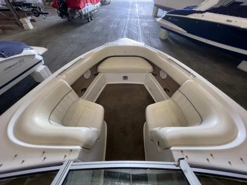 Slide: The Image of Interior view of a 2008 Cobalt 252 boat with white seating. - 5