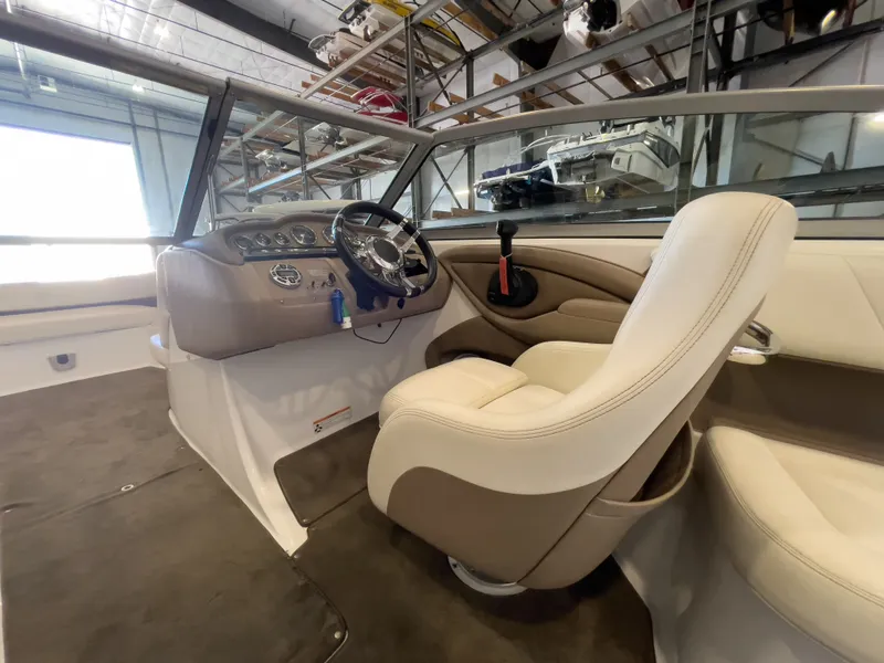 Slide: The Image of Interior of a 2008 Cobalt 252 boat with helm station. - 6