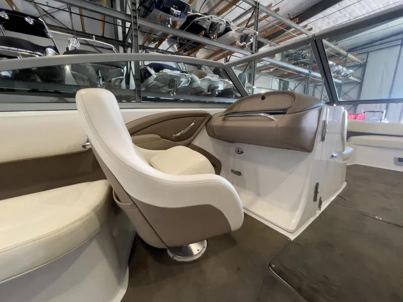 Slide: The Image of Interior of a 2008 Cobalt 252 boat with beige seating. - 8