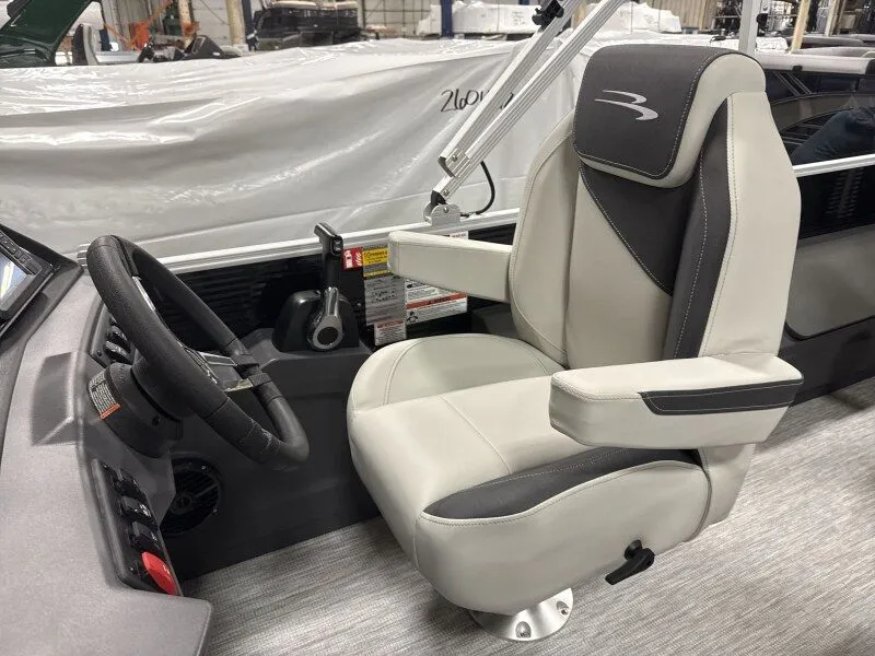 Slide: The Image of Interior of Bennington 20SF-Snap 2026 with steering wheel and seat. - 10