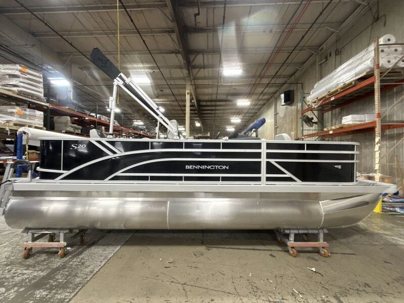 Slide: The Image of Bennington 20SF-Snap pontoon boat 2026 in warehouse. - 2