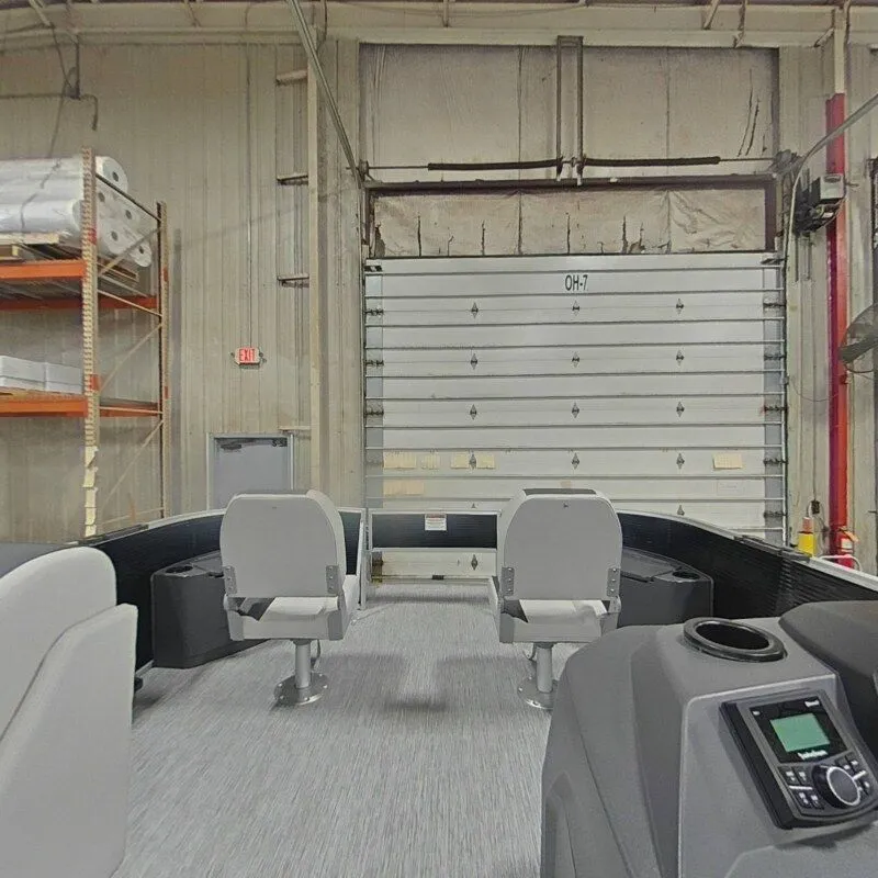 Slide: The Image of Interior view of Bennington 20SF-Snap 2026 boat in a warehouse. - 7