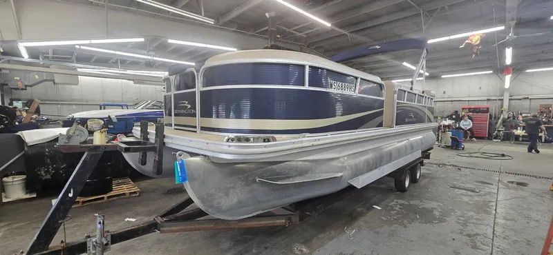 The Image of 2010 Bennington 2274GLi pontoon boat in workshop. - 1