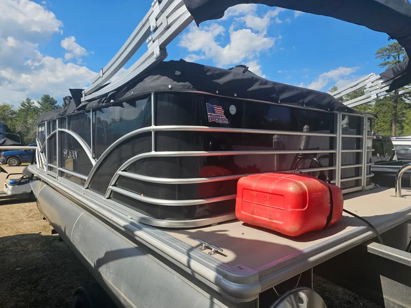 Slide: The Image of 2019 Sylvan MIRAGE 818 CRS pontoon boat with red fuel canister. - 3
