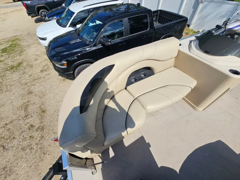 Slide: The Image of Interior of a 2019 Sylvan MIRAGE 818 CRS boat with beige seating. - 5
