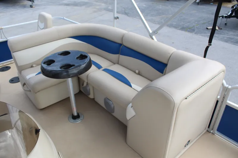 Slide: The Image of Interior of a 2013 Godfrey SW 2286 FC pontoon boat with seating area. - 10