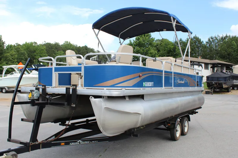 Slide: The Image of 2013 Godfrey SW 2286 FC pontoon boat on trailer. - 2