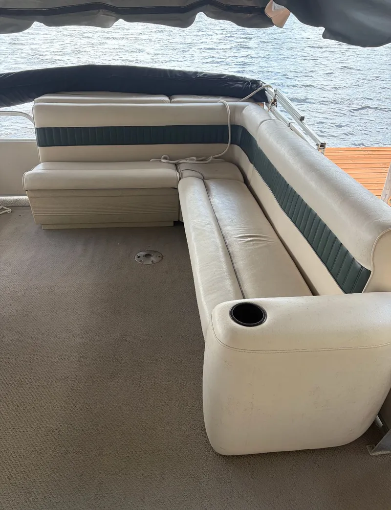 Slide: The Image of Interior of a 2002 Premier L208 Leisure boat with seating area. - 24