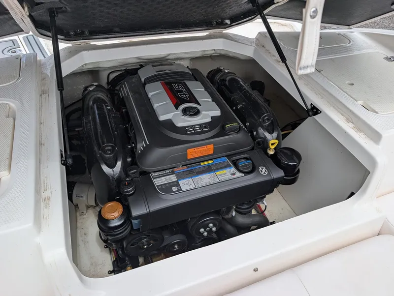 Slide: The Image of Engine compartment of a 2020 Chaparral SSi 210 boat with Mercury 4.5L engine. - 13