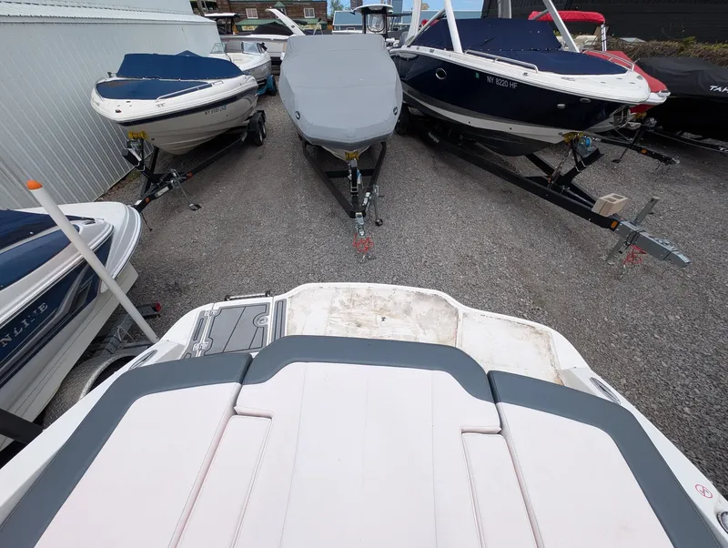 Slide: The Image of Chaparral SSi 210 boats in a parking lot, 2020 model. - 14
