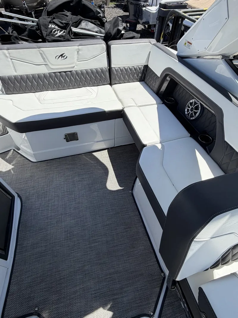 Slide: The Image of Interior of a 2018 Monterey SS 298SS boat with luxurious seating. - 13