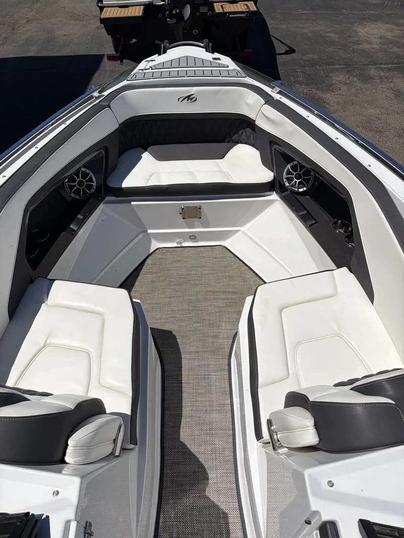 Slide: The Image of Interior of a 2018 Monterey SS 298SS boat with white seating. - 17