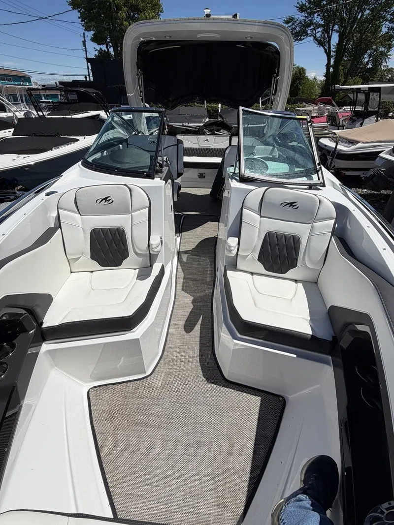 Slide: The Image of Interior of a 2018 Monterey SS 298SS boat with white seating. - 19