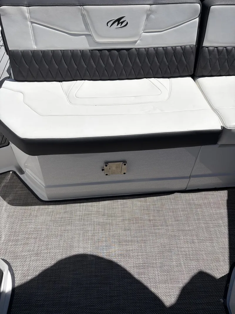 Slide: The Image of Seating area of a 2018 Monterey SS 298SS boat with gray carpet. - 5