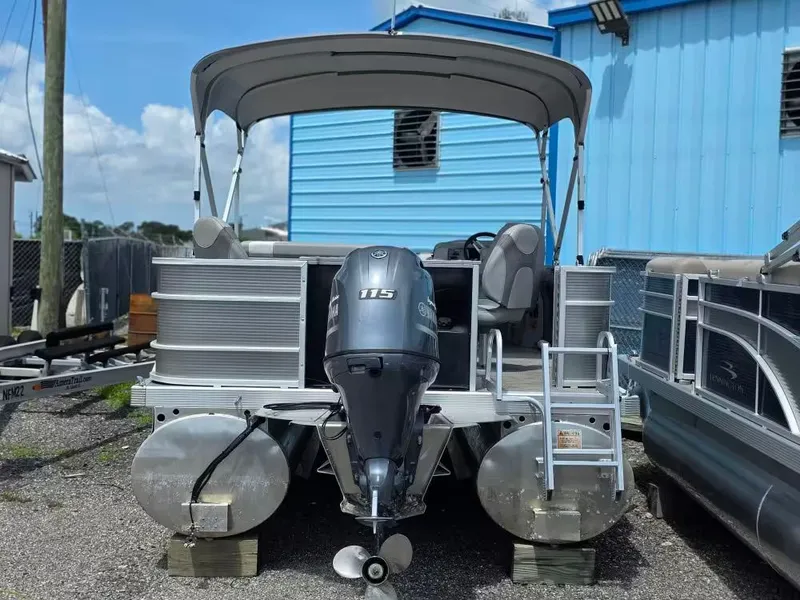 Slide: The Image of 2021 Bennington 22SSX pontoon boat with outboard motor. - 4