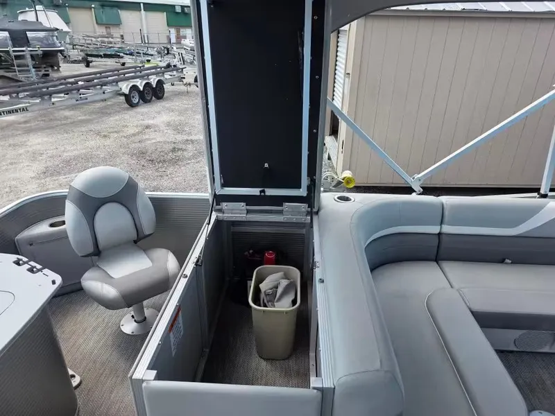Slide: The Image of Interior of a 2021 Bennington 22SSX pontoon boat with seating area. - 7