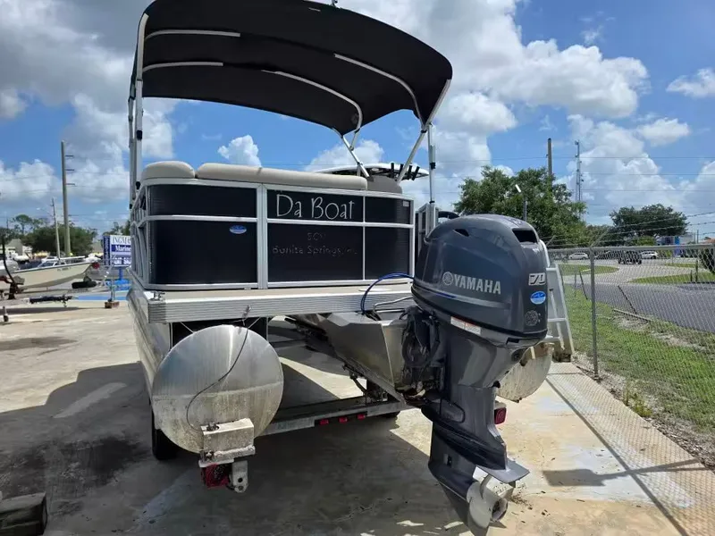 Slide: The Image of 2016 Bennington SX20 pontoon boat with Yamaha engine. - 2