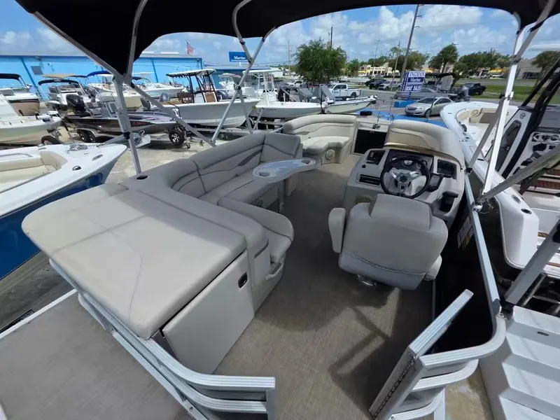 Slide: The Image of Interior of a 2016 Bennington SX20 pontoon boat with seating. - 6