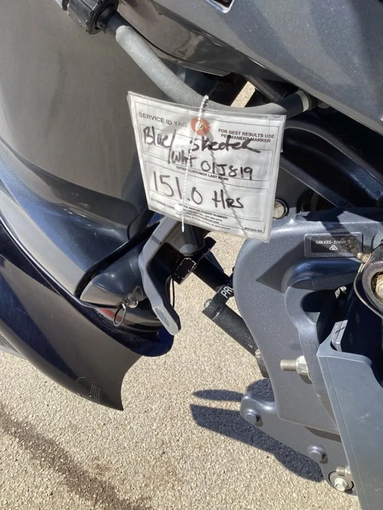 Slide: The Image of 2019 Skeeter ZX225 boat motor with service tag, 151 hours. - 11
