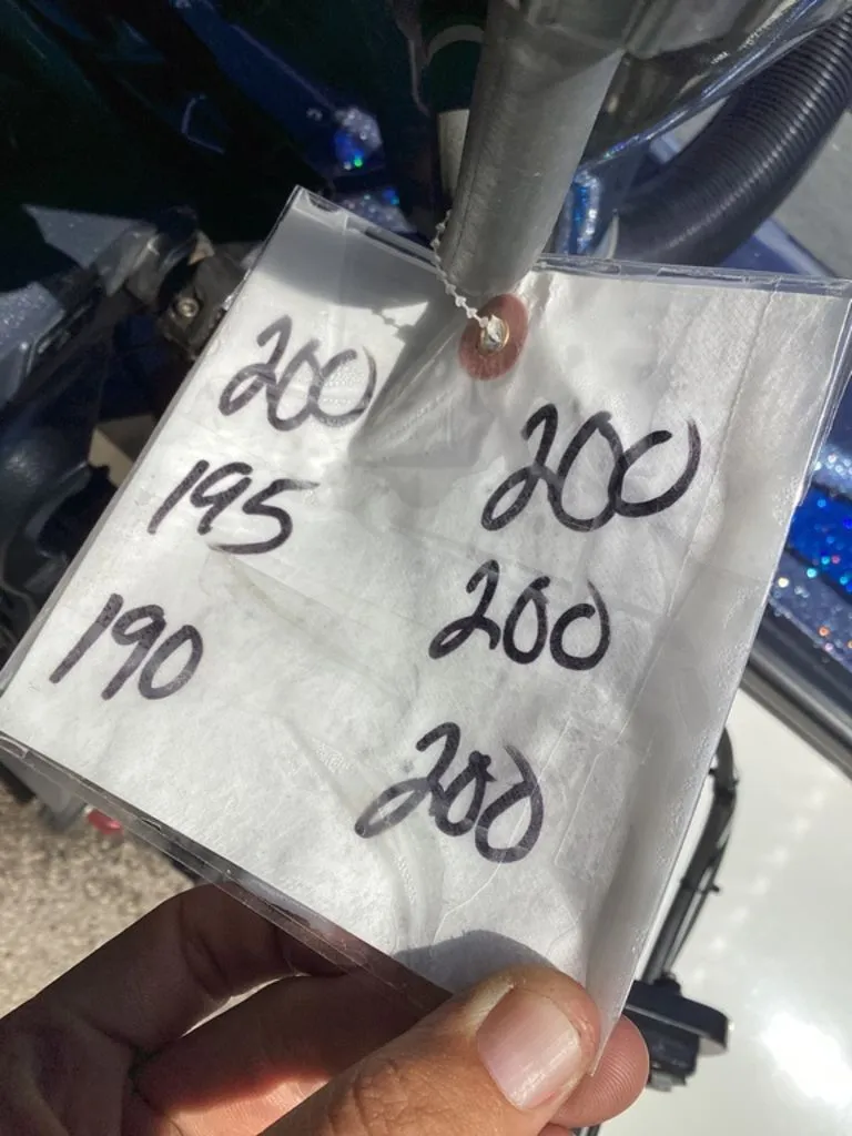 Slide: The Image of Handwritten numbers on a note, Skeeter ZX225 boat, 2019 model. - 12