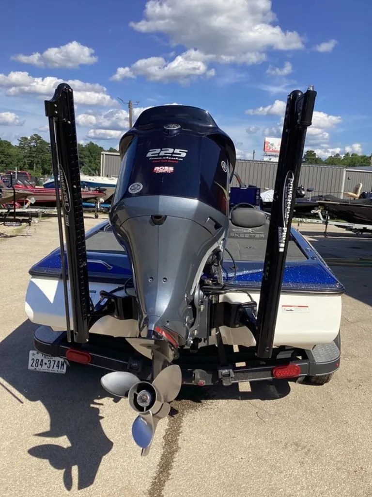 Slide: The Image of 2019 Skeeter ZX225 boat with outboard motor, sunny day. - 13