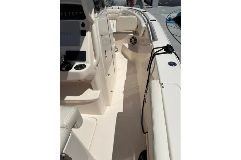 Slide: The Image of 2023 Grady-White Fisherman 236 boat interior, featuring sleek design and modern controls. - 10