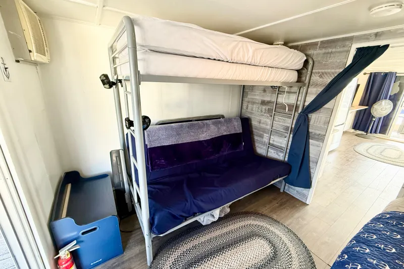 Slide: The Image of Bunk bed with blue futon in 1986 Hilburn 4014 Executive interior. - 15