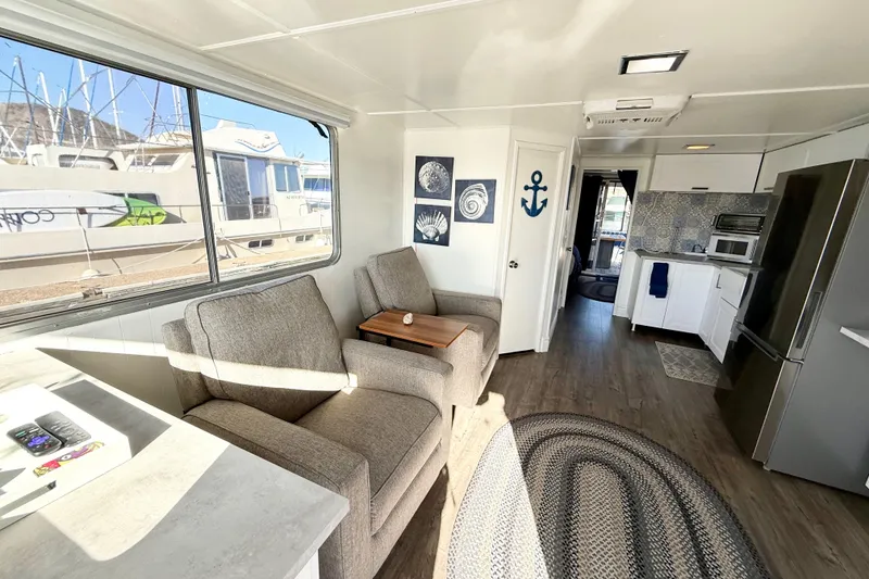 Slide: The Image of Interior of 1986 Hilburn 4014 Executive houseboat with modern decor and comfortable seating. - 2