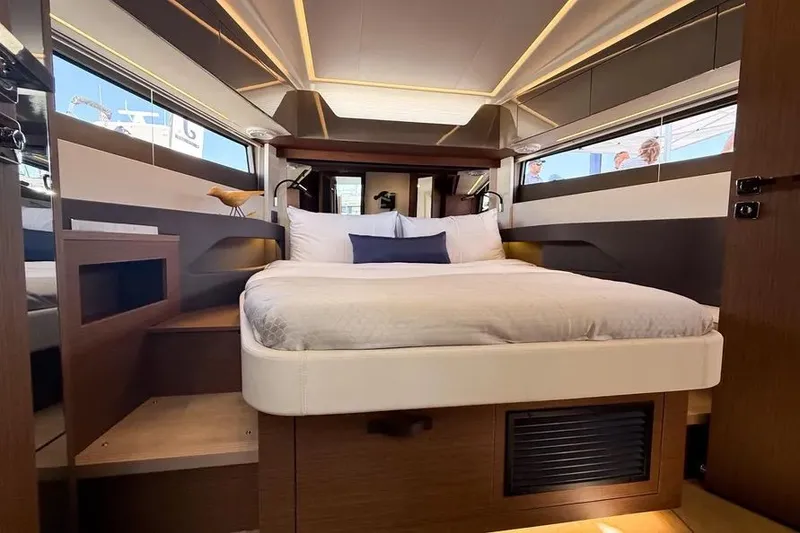 Slide: The Image of Luxurious bedroom in the Wellcraft 44 Explorer 2026 yacht. - 13