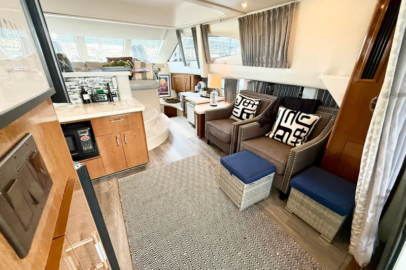 Slide: The Image of Luxurious interior of a 2007 Carver 36 Sedan yacht with modern furnishings and elegant decor. - 17