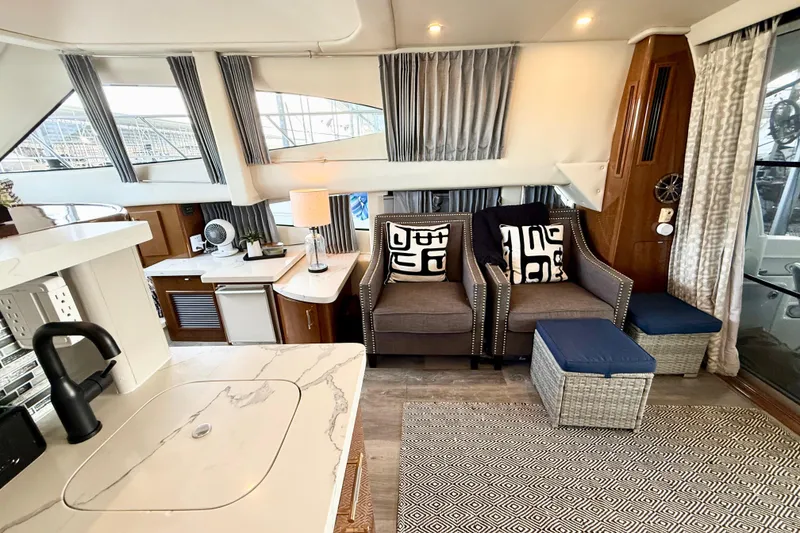 Slide: The Image of Luxurious interior of a 2007 Carver 36 Sedan yacht with modern furnishings and elegant decor. - 19