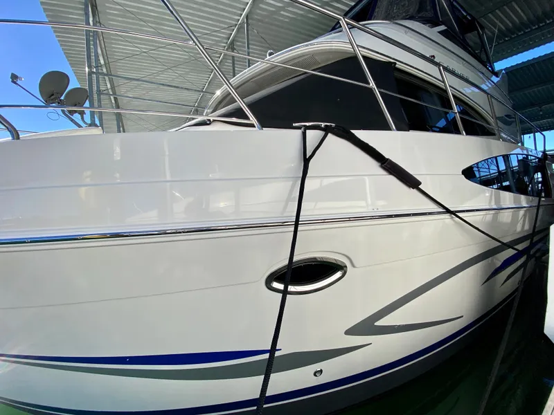 Slide: The Image of 2007 Carver 36 Sedan yacht docked in harbor. - 2