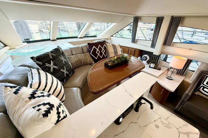 Slide: The Image of Luxurious interior of a 2007 Carver 36 Sedan yacht with stylish seating and decor. - 20