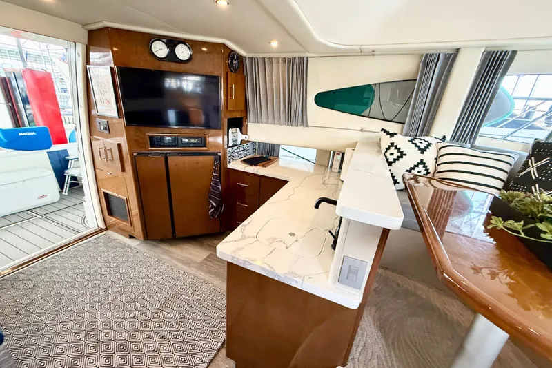 Slide: The Image of Interior of a 2007 Carver 36 Sedan yacht with modern amenities and stylish decor. - 22