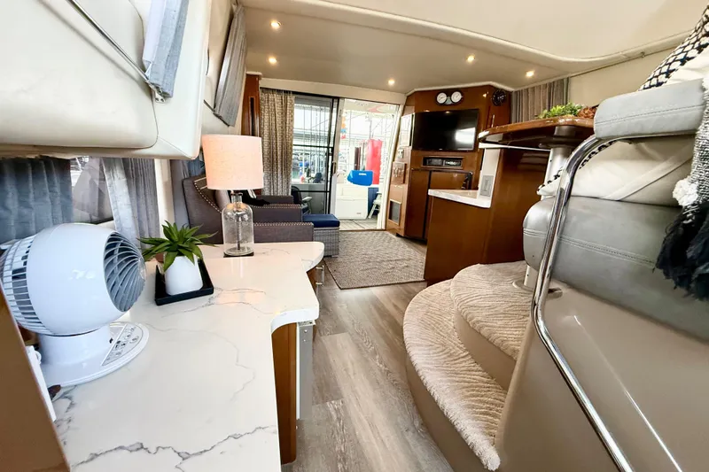 Slide: The Image of Luxurious interior of a 2007 Carver 36 Sedan yacht with modern amenities and elegant decor. - 34