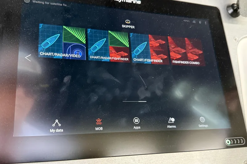Slide: The Image of Raymarine navigation display showing chart, radar, and fishfinder options on a 2007 Carver 36 Sedan. - 46