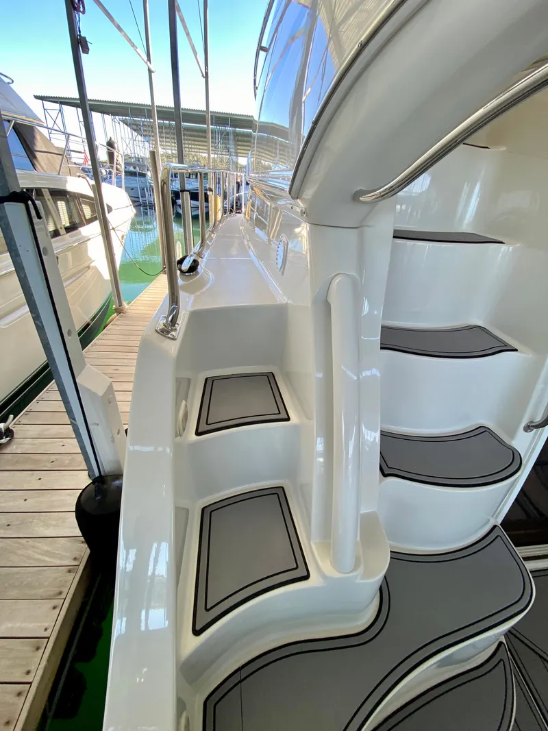 Slide: The Image of 2007 Carver 36 Sedan yacht with sleek stairs and deck. - 6