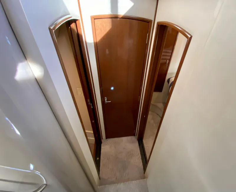 Slide: The Image of Interior of 2007 Carver 36 Sedan with wooden doors. - 7