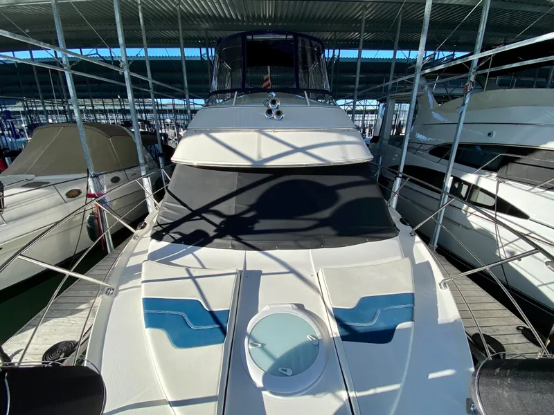 Slide: The Image of 2007 Carver 36 Sedan yacht docked, front view. - 9