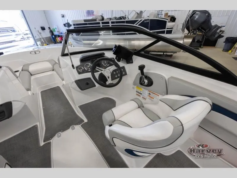 Slide: The Image of Interior of a 2022 Tahoe 210SI boat with steering console. - 11