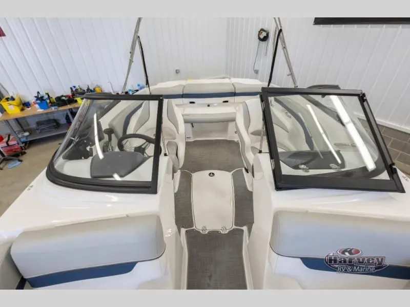 Slide: The Image of Interior view of 2022 Tahoe 210SI boat in a workshop. - 17