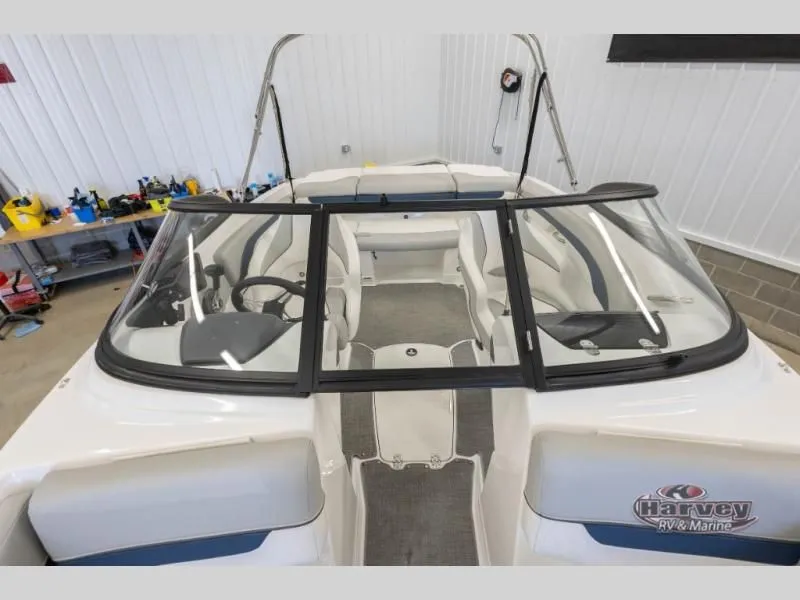 Slide: The Image of Interior view of a 2022 Tahoe 210SI boat in a workshop. - 18