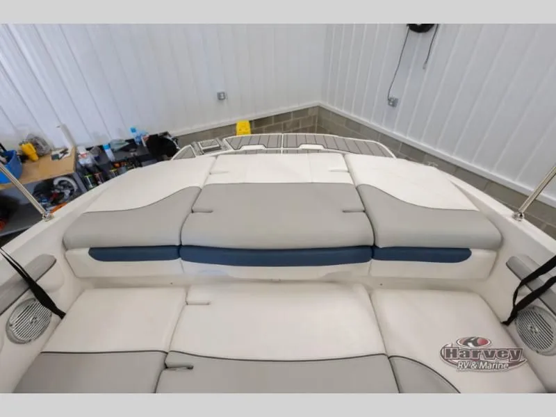Slide: The Image of Interior view of a 2022 Tahoe 210SI boat with gray and blue seating. - 24